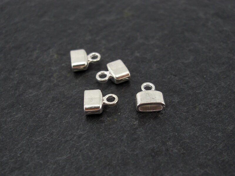 10 Endkappen flach oval für 6 x 2,5 mm Band, antik silber,10132