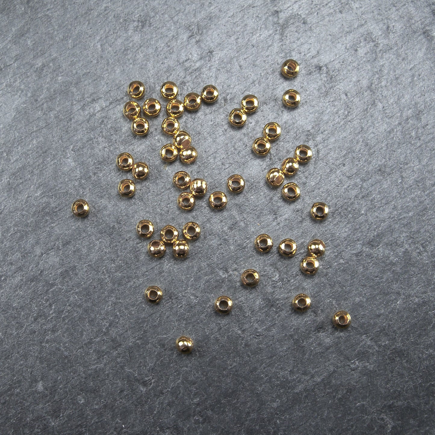 50 kleine Perlen 3mm, goldfarben, 10206