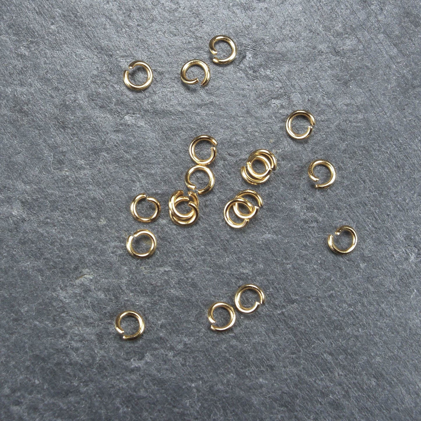 50 Binderinge 4 mm, Edelstahl, goldfarben, 10112