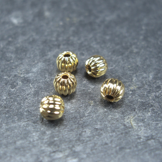 5 kleine Perlen 4mm, geriffelt, Gold, Kürbis, 10389
