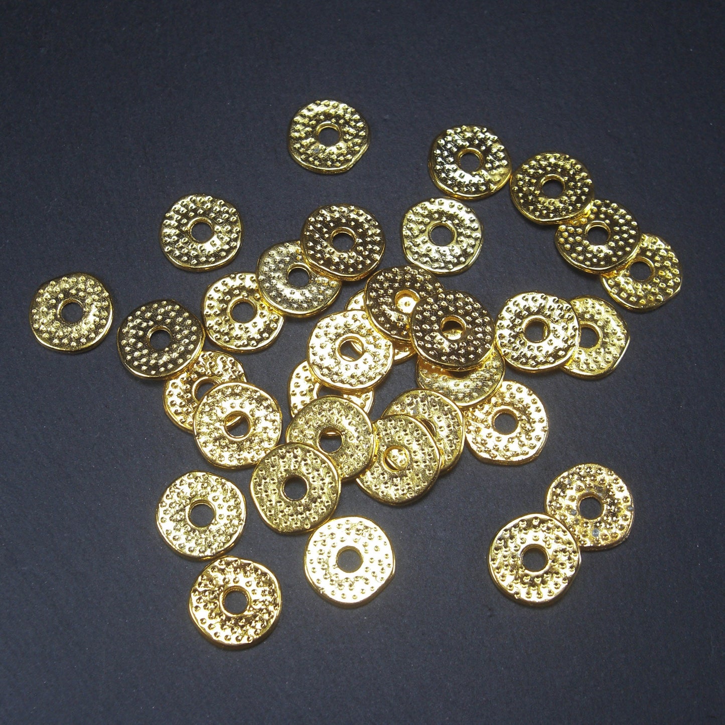 10 Spacer Perlen, Donuts goldfarben, 10460