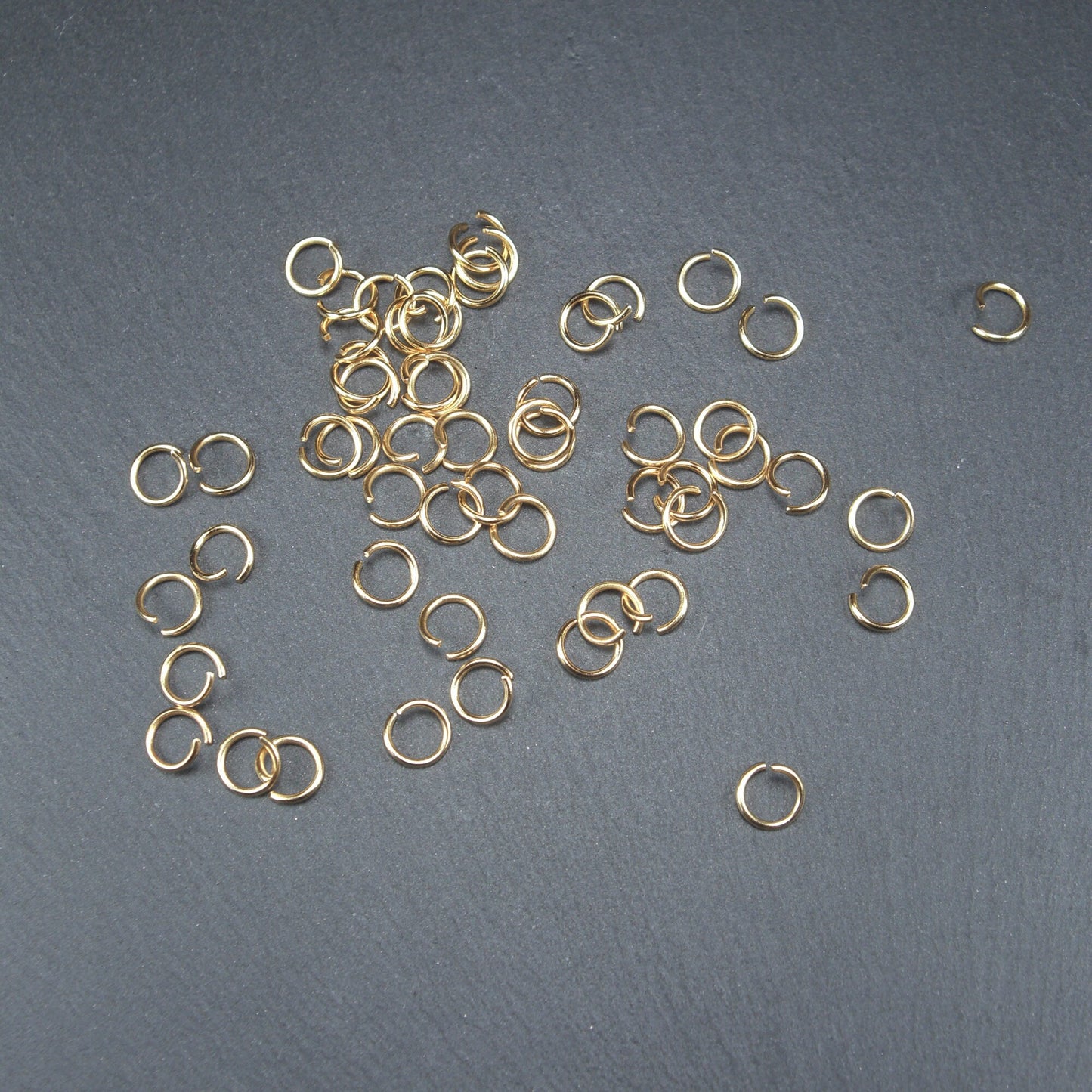 50 Binderinge 6 mm, Edelstahl, goldfarben, 10679